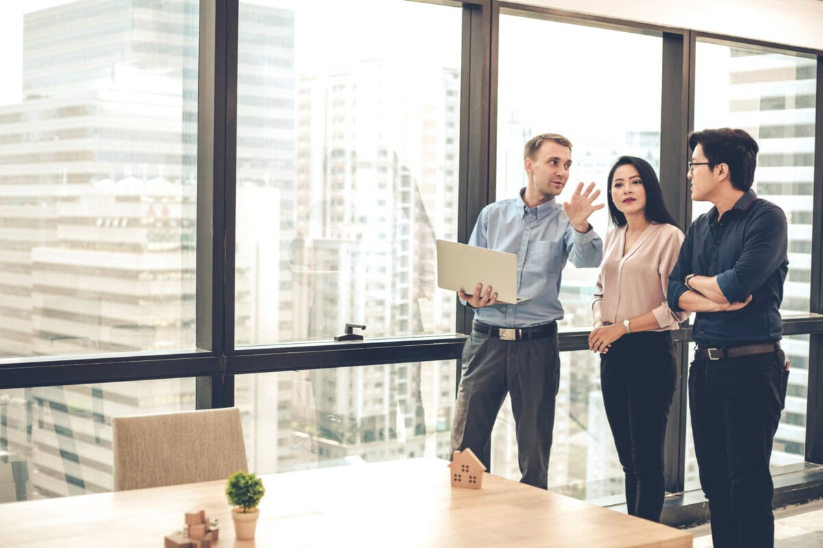 house,sales,representatives,are,taking,customers,to,see,and,offer
