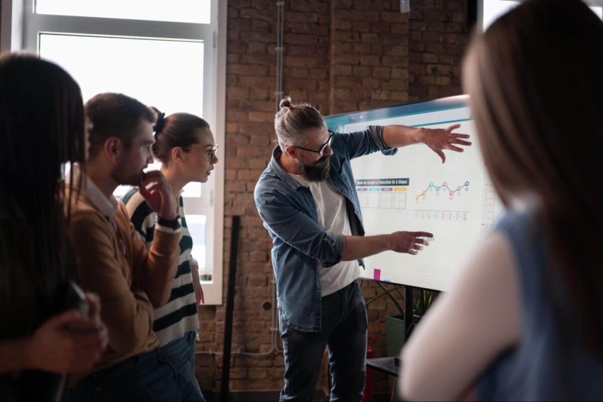 team discussing ai voice agent services for businesses