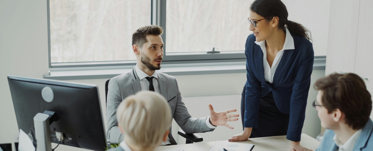 Business team discussing Fin AI Agent implementation and customer support automation strategy